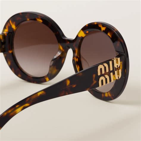 miu miu ovale sonnenbrille|sonnenbrille mit blauer gläser.